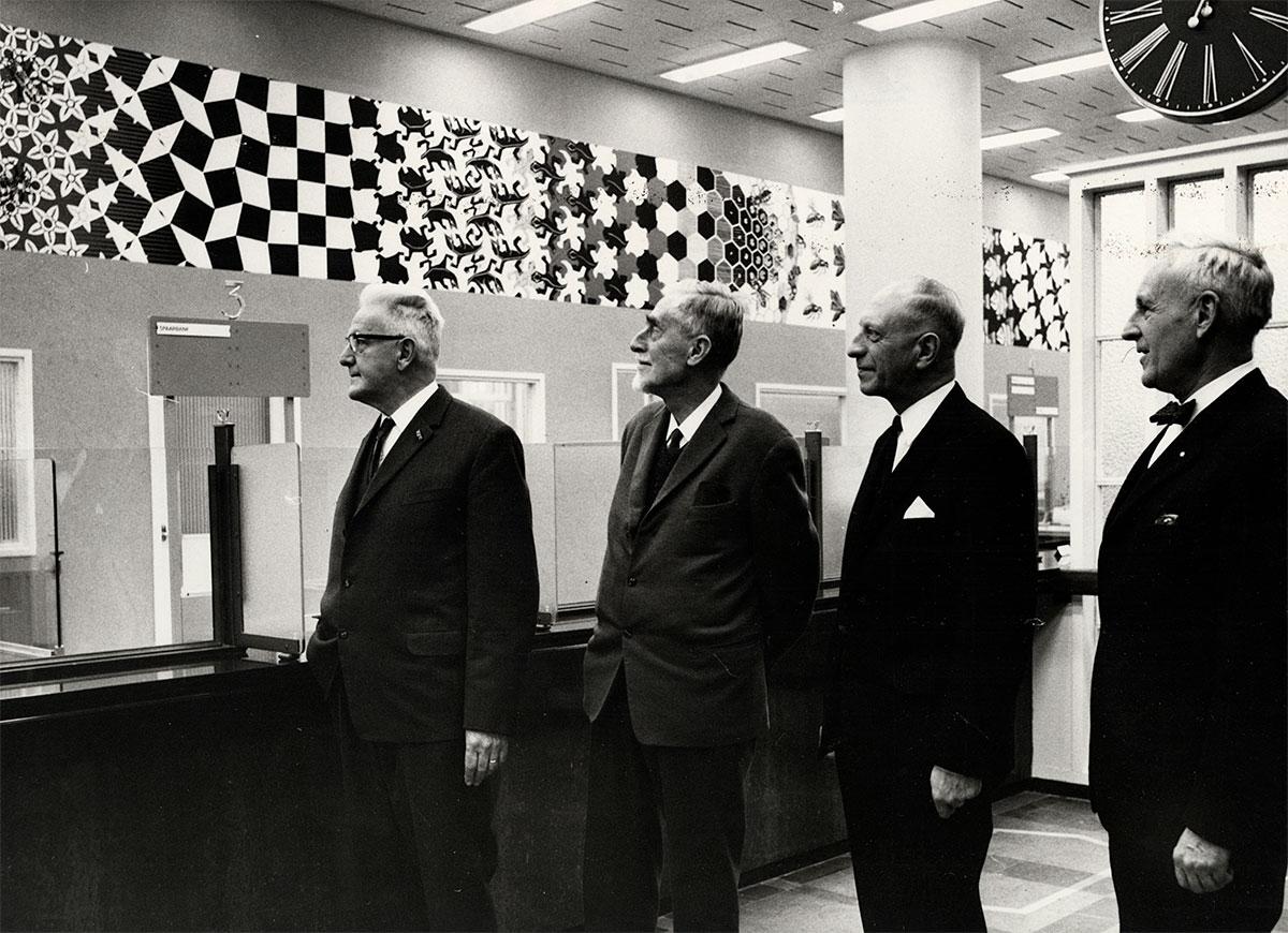 The large Metamorphosis III in The Hague is opened for the public in 1968. Escher second to the left.