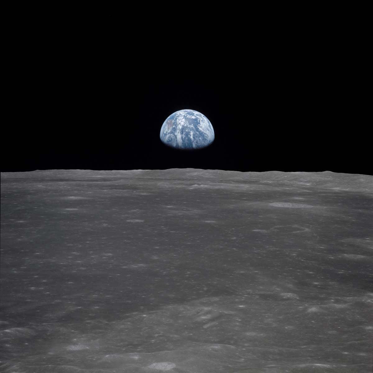 Earth seen from the moon surface, the famous photograph taken during the Apollo 11 mission.