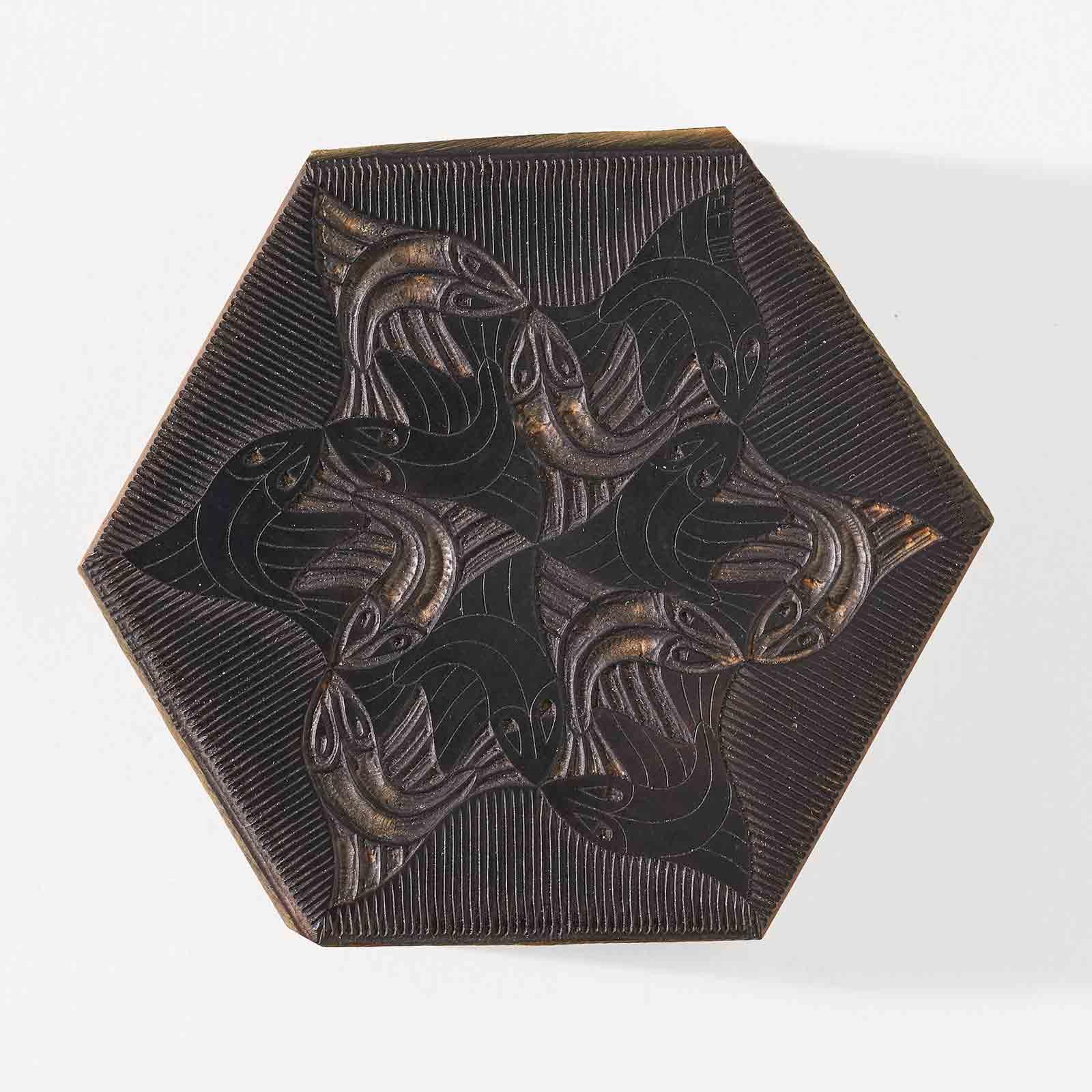 M.C. Escher, Fish (vignette), woodblock, 1955. Collection Kunstmuseum Den Haag, on long-term loan from Mr. and Mrs. Hoogendijk-Floor